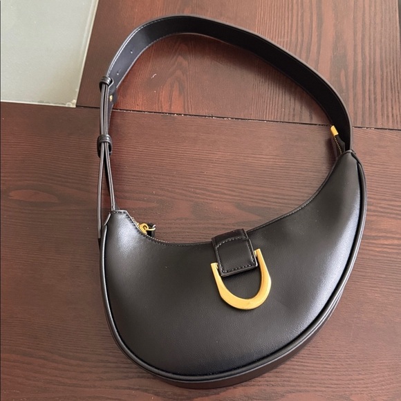 Madison West Handbags - Madison West Black Shoulder Bag with Gold Buckle